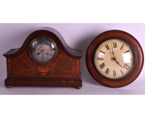 AN EDWARDIAN MAHOGANY MANTEL CLOCK together with a small station style wall clock. 12.5ins &amp; 9ins wide.