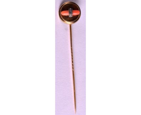 A 1950S 9CT YELLOW GOLD AND CORAL LADIES STICK PIN Attributed to Cartier (marks indistinct). 3.6 grams.