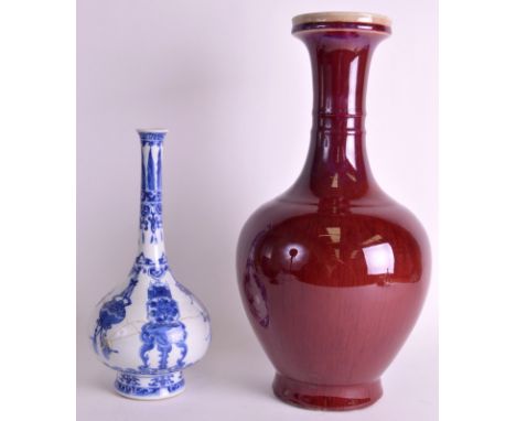 A 17TH CENTURY CHINESE KANGXI BLUE AND WHITE PORCELAIN VASE C1680 together with a Qing dynasty flambé glazed baluster vase. 1