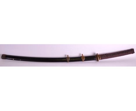 A 19TH CENTURY JAPANESE MEIJI PERIOD SAMURAI SWORD with lacquered scabbard and blued steel blade, ray skin grip and brass mou