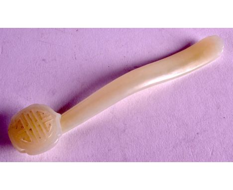 AN EARLY 20TH CENTURY CHINESE CARVED WHITE JADE RUI SCEPTRE possibly a hair slide, with carved terminal. 4.5ins long.