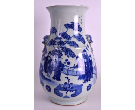 A LATE 18TH/19TH CENTURY CHINESE TWIN HANDLED HU TYPE VASE Transitional style, painted with figures painting a scroll. 1ft 1.