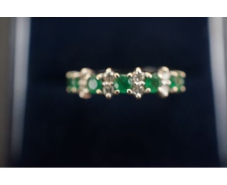 14ct White gold emerald &amp; diamond ring, featuring 5 claw set, found faceted, genuine emeralds, weighting a total of appro