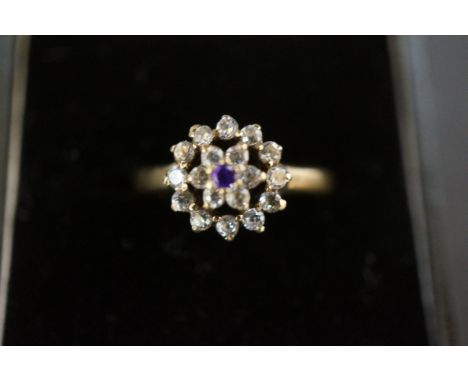 9ct Gold cluster ring set with purple &amp; clear stones Size O 