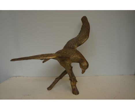 Large brass model of a bird of pray Height 52 cm 