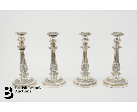 Four silver plated candlesticks, approx. 25cms h.&nbsp;Condition ReportOne candlestick has come apart. Silver plate has rubbe