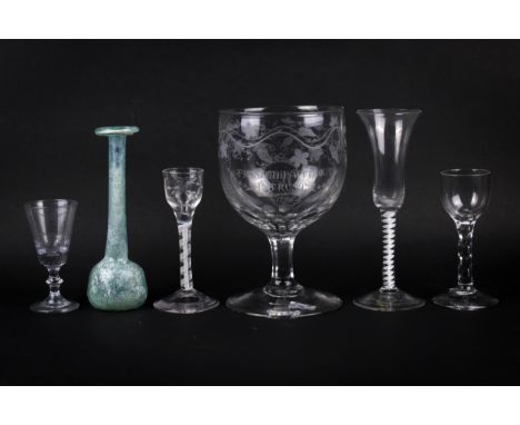 A collection of five assorted Georgian drinking glasses plus a Roman style bottle. Including an engraved rummer dated 1796 an