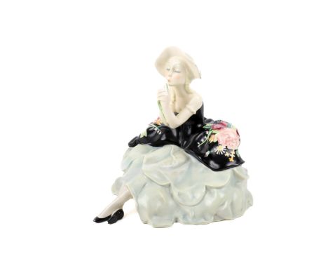 Sandro Vacchetti (1889-1976), ESSEVI. An Italian Art Deco figurine depicting a seated young woman with flowing dress of paint