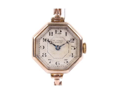 A 9ct gold watch JW Benson wristwatch. Of octagonal form, with black Arabic numerals to the silvered face, blued hands, case 