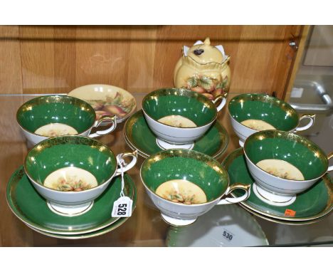 A GROUP OF AYNSLEY ORCHARD GOLD TEA AND GIFT WARES, comprising six teacups and saucers with speckled green and gilt foliate b