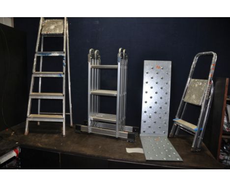 A FOLDING ALUMINIUM PLATFORM LADDER with two treadle plates, folded height 94cm, a set of 170cm high aluminium step ladder an