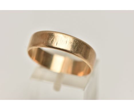 A WIDE 9CT GOLD BAND RING, approximate width 5.6mm, hallmarked 9ct Birmingham, ring size centre U, approximate gross weight 2