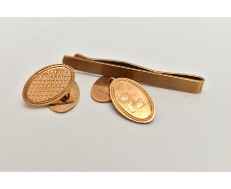 A CASED 9CT GOLD PAIR OF CUFFLINKS AND A TIE CLIP, Automotive Products Group Golden Jubilee case, with a pair of oval chain l