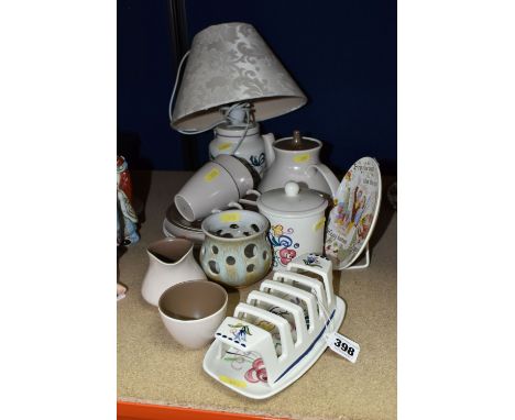 A GROUP OF POOLE POTTERY, comprising a Traditional Ware Bluebird table lamp, preserve/jam pot and toast rack, a small transfe