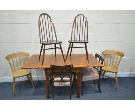 A MID CENTURY TEAK DRAW LEAF TABLE, extended length, 152cm x closed length 91cm x depth 84cm x height 77cm, two Ercol quaker 