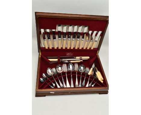 A WOODEN CANTEEN WITH CUTLERY, contains a six person table setting of cutlery, some pieces not original to the set, with shar