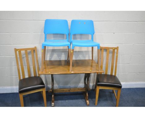 AN OAK TRESTLE DINING TABLE, length 106cm x depth 63cm x height 75cm, a pair of blue plastic stacking chairs, and two light o