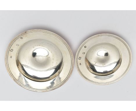 TWO ELIZABETH II CIRCULAR SILVER DISHES, with banded borders and convex centres, makers Mappin &amp; Webb, London 1971 /72, d