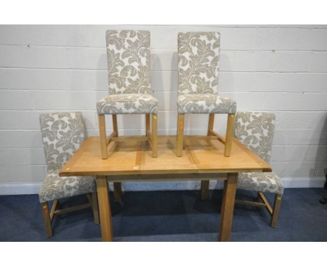 A LIGHT OAK EXTENDING DINING TABLE, with a single fold out leaf, extended length 166cm x closed length 116cm x depth 85cm x h