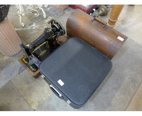 A Singer cased sewing machine and a typewriter