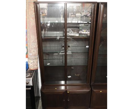 Illuminated Glazed Ercol Display Cabinet with Cupboard under 