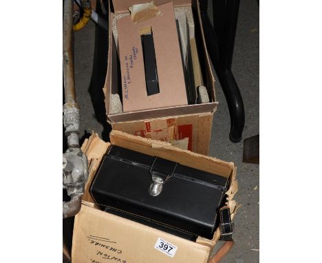 Cased Cine Camera and Boxed Projector 