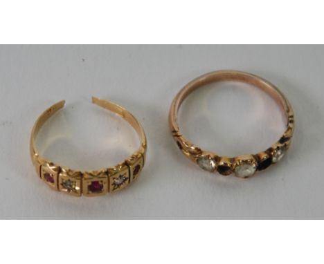 EARLY TWENTIETH CENTURY 18ct GOLD RING, set with two tiny diamonds and two tiny rubies (one ruby missing and shank cut), 2.2g