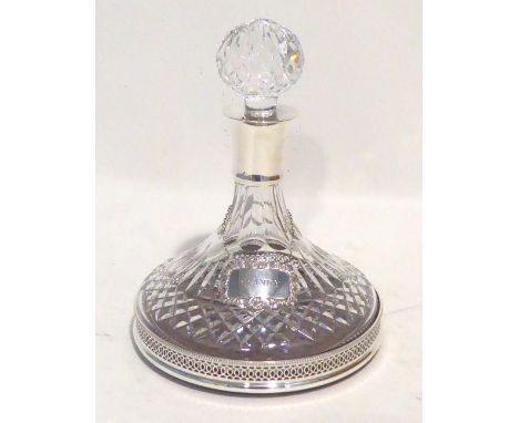 A WATERFORD CUT GLASS 'LISMORE' PATTERN SHIPS DECANTER, with plain silver mounted neck and the spherical stopper, Dublin 1980