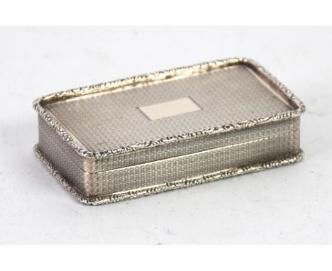 GEORGE V ENGINE TURNED SILVER SNUFF BOX, of rectangular form with raised floral borders and vacant cartouche, 2 3/4" x 1 1/2"