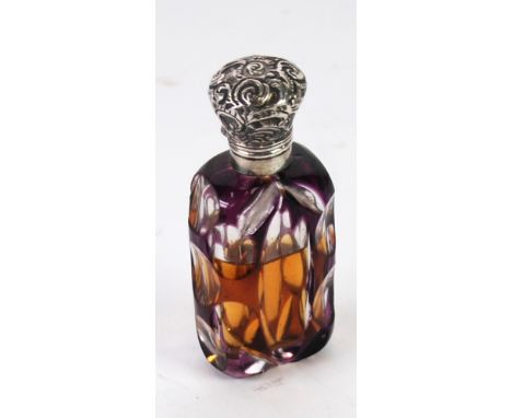 AMETHYST CASED AND FLASH CUT GLASS SCENT BOTTLE with embossed silver coloured metal collar and cover, the hinged cover decora