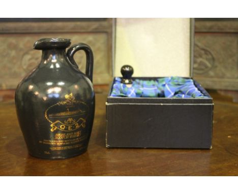 A STONEWARE FLAGON containing Highland Malt Scotch Whisky by Morrison Bowmore commemorating the liner Queen Elizabeth II, and