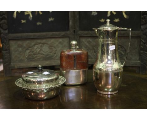 A SILVER PLATED HIP FLASK with leather mount, together with a silver plated thermos flask in the form of a jug and a silver p