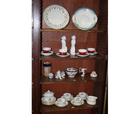 A COLLECTION OF CHINA including a Lladro puppy, a Doulton beaker, Worcester, Mintons and other pieces
