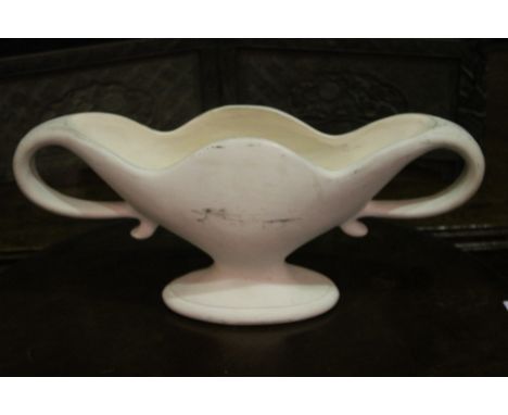 A WHITE GROUND CERAMIC VASE of oval form with shaped handles, by Fulham Pottery Company, 58cm wide