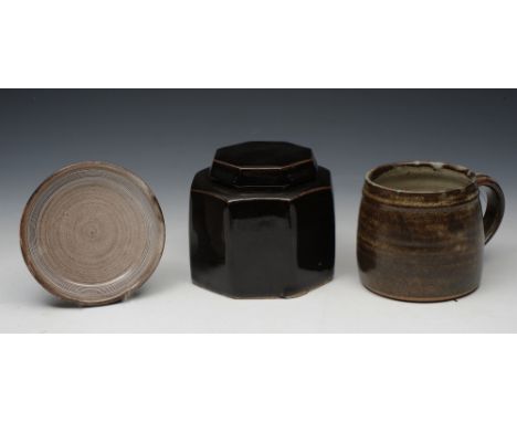 A DAVID LEACH OCTAGONAL BLACK GLAZED COVERED JAR, a mug and a small dish