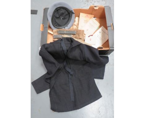 Small Selection of Various Uniforms and Equipment Items consisting Royal Navy, dark blue, pull over jacket. &nbsp;The right a