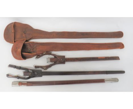 Three Various Field Scabbards and Transit Bags consisting 2 x leather covered, wooden field scabbards (one damaged). &nbsp;Bo