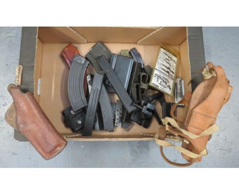 Two Various Holsters and Various Gun Magazines consisting tan leather, shoulder holster possibly for a Colt style auto pistol