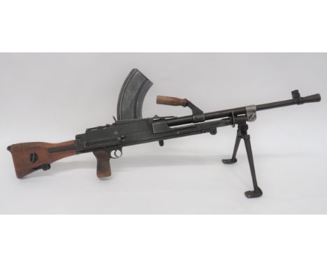 Deactivated MKII Bren Light Machine Gun .303, 24 inch barrel with front flash hider and side mounted sight. Top wooden carryi