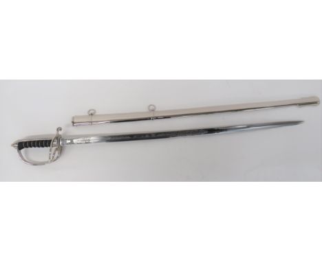 Current Issue Army Air Corps Officer's Sword 33 3/4 inch, single edged, slightly curved blade with central fuller. Fine etche