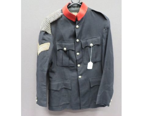 Queens Own Dorset Yeomanry Sergeant's Patrol Tunic dark blue, single breasted tunic.&nbsp; High red collar.&nbsp; Pointed cuf