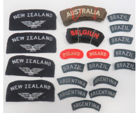 Various Nationality Shoulder Titles embroidery titles include 12 x white on khaki Austria (original bundle) ... 8 x red on da