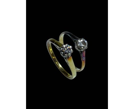 Two solitaire diamond 18 carat gold rings, size M & O.