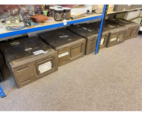 Five steel ammunition boxes.