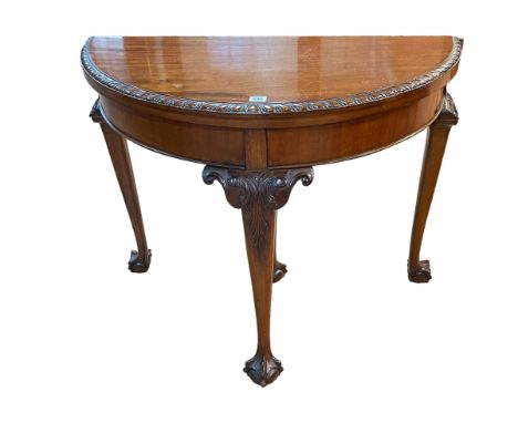 Mahogany Chippendale style demi lune fold top card table, 75cm by 91cm by 45cm (closed).