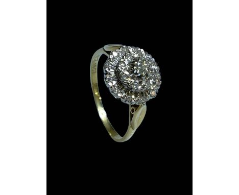 Diamond cluster 18 carat gold ring, size R.
