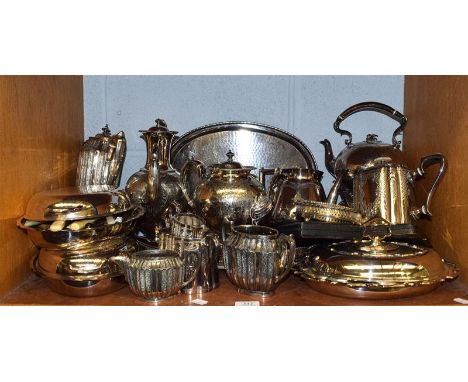 A large quantity of silver plated wares including part tea services, various flatwares, spirit kettle on stand and entree dis