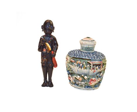 A Chinese coloured ivory snuff bottle circa 1920's and a Japanese figural wood netsuke (2).  Snuff bottle with hair cracks ar