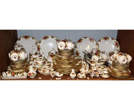 A quantity of Royal Albert ''Old Country Roses'' dinner and tea wares (one shelf).  Not all items assesed. A cursory look acr