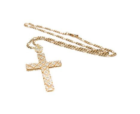 A diamond cross pendant on chain, pendant length 5.5cm, chain length 44cm.  The piece is in fair condition, the cross is slig